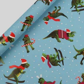 Síelő dinoszauruszok karácsonyi csomagolópapír 